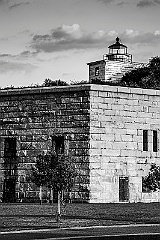 Clarks Point Light on Stone Building of Fort Taber - BW